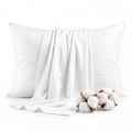 Faunna white cotton pillowcases with cotton detail