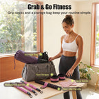 Pink MAXU resistance band kit contents with handle, foot straps, grip socks, and storage bag